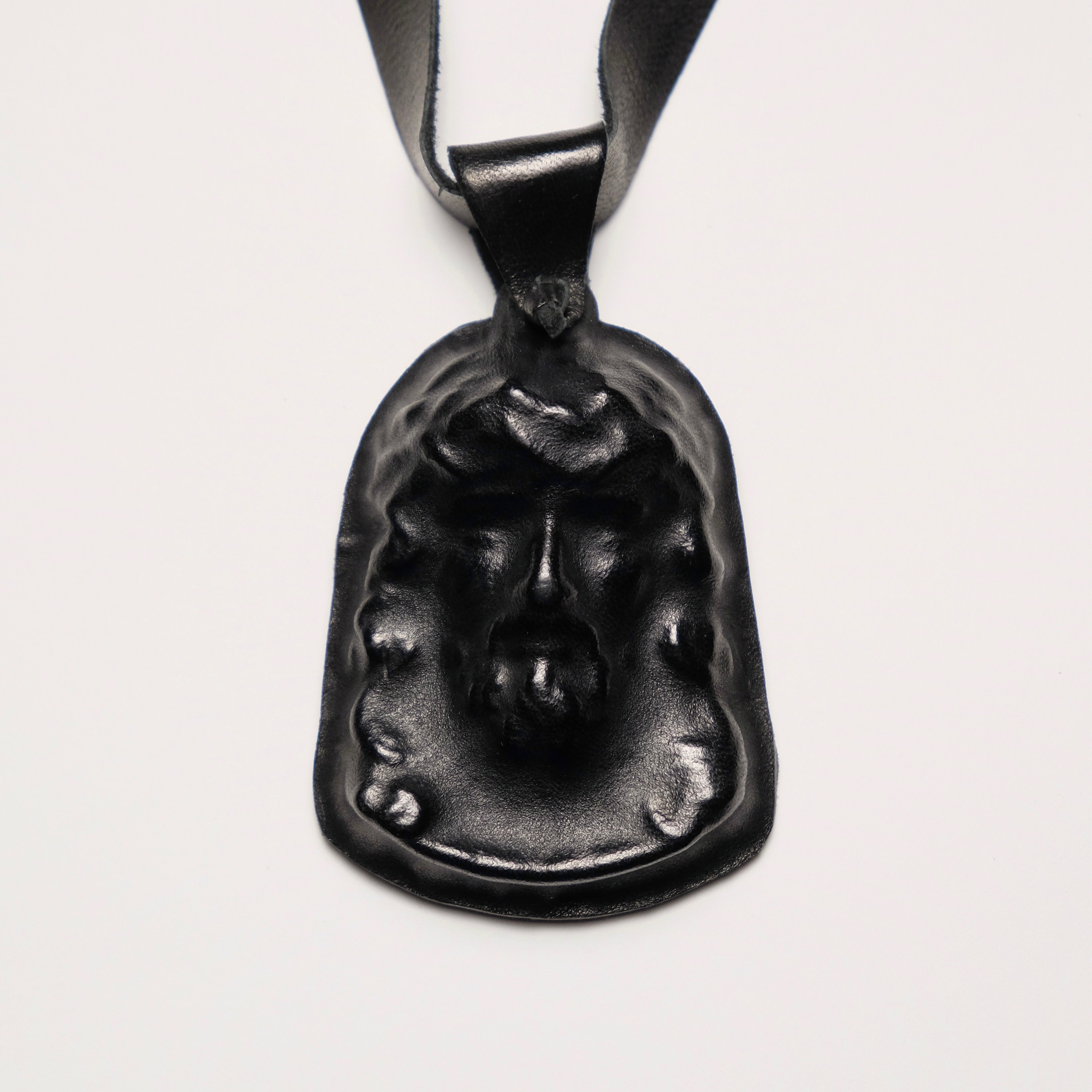 Leather Jesus Piece